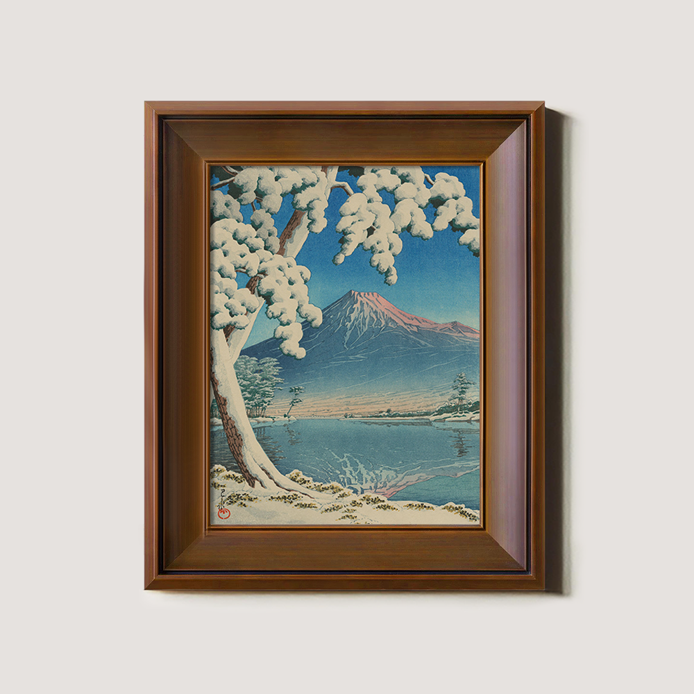 Snowy Tree Framing Mount Fuji across Lake