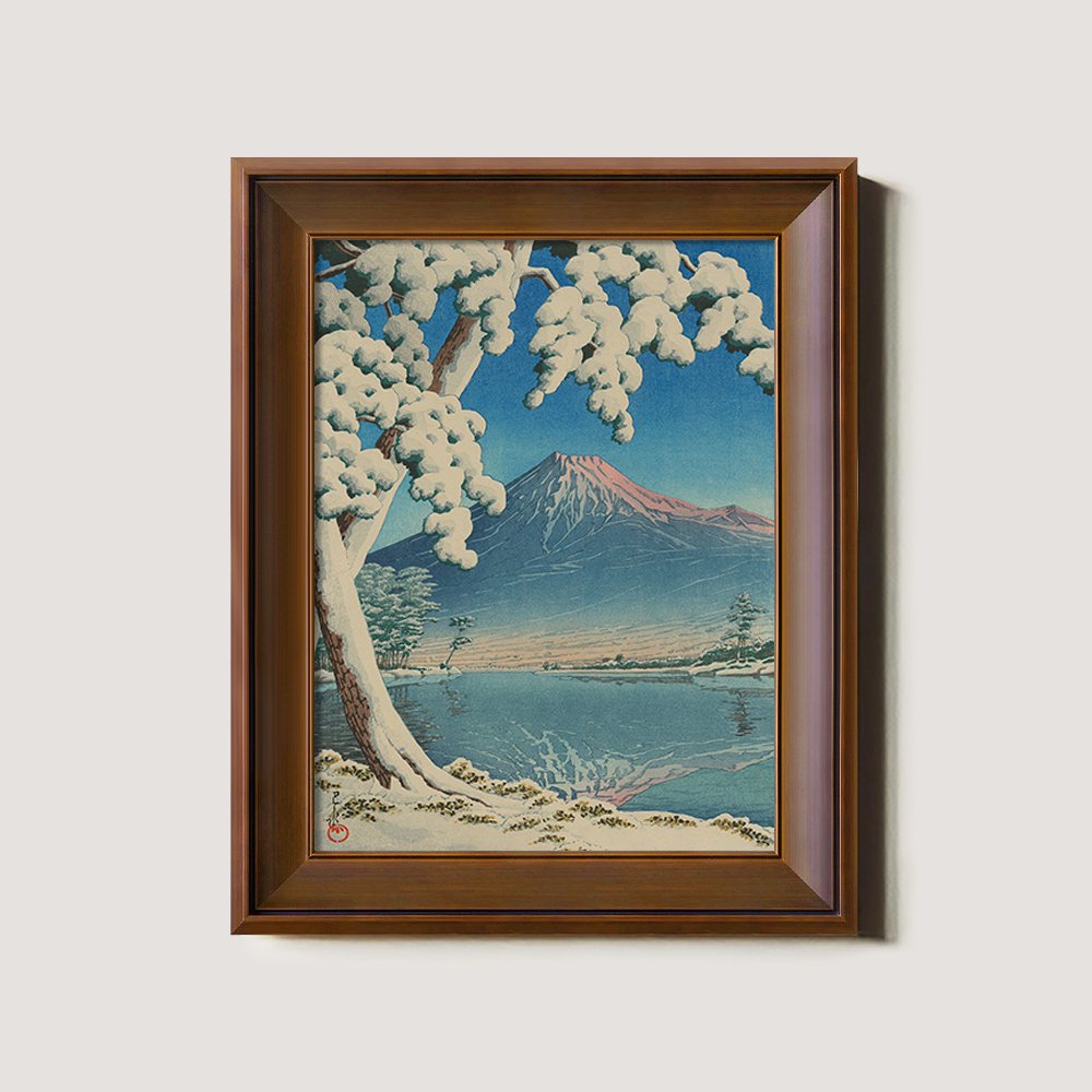 Snowy Tree Framing Mount Fuji across Lake