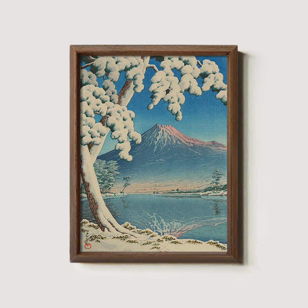 Snowy Tree Framing Mount Fuji across Lake