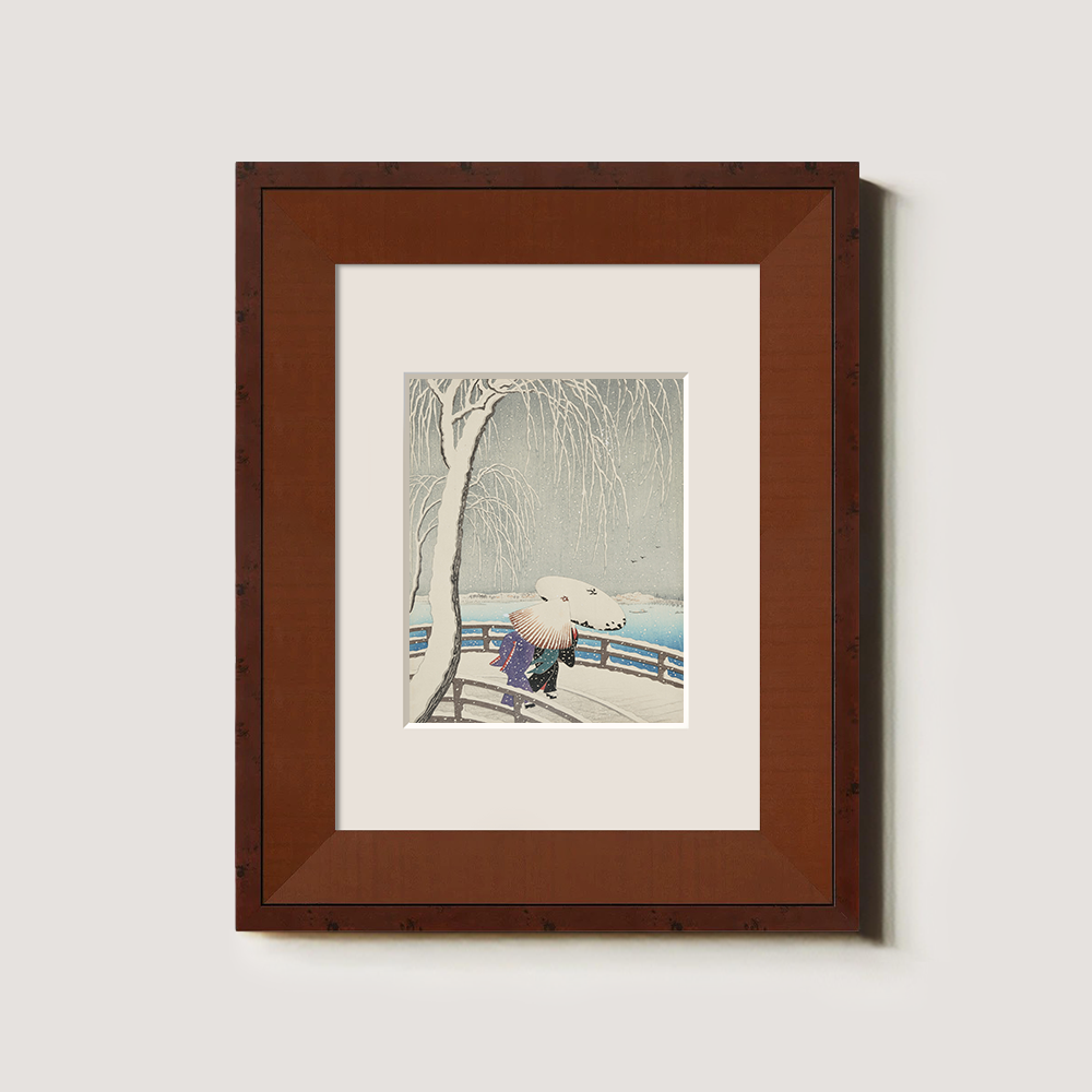 Woman Crossing a Snow-Covered Bridge