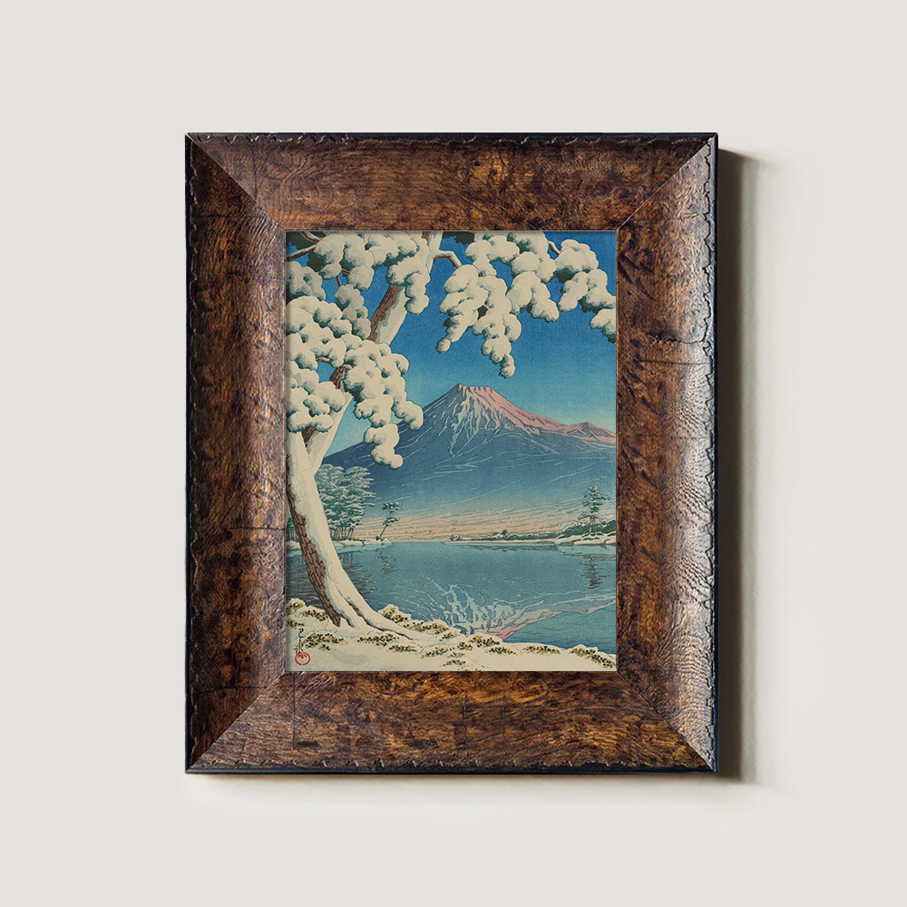 Snowy Tree Framing Mount Fuji across Lake