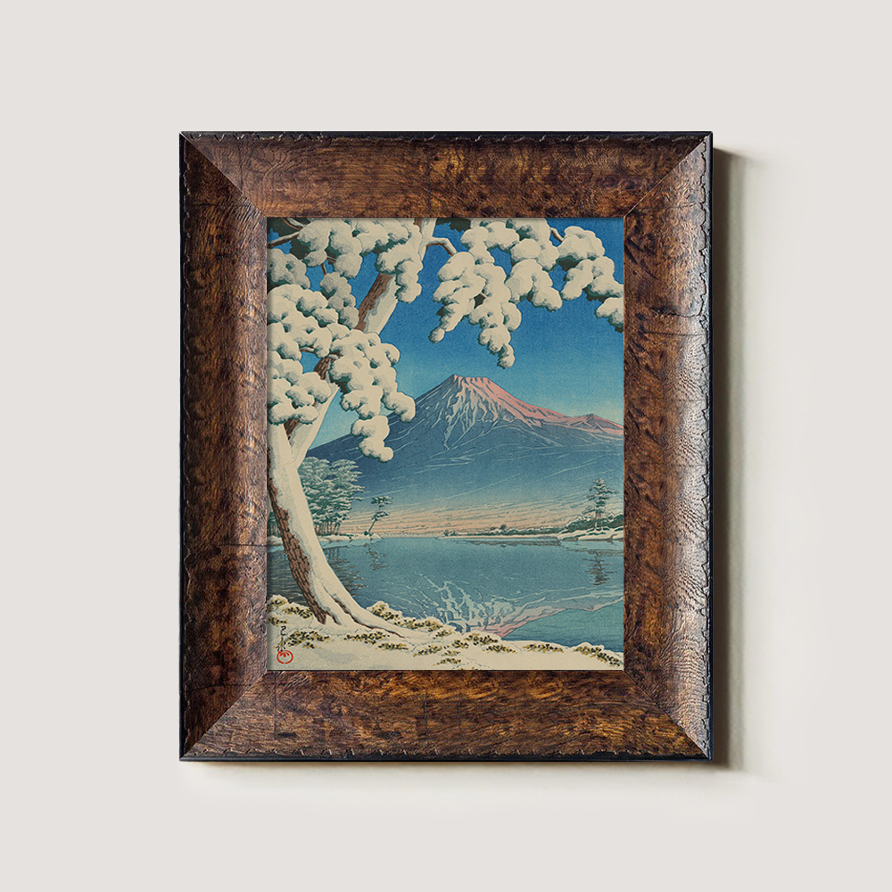 Snowy Tree Framing Mount Fuji across Lake