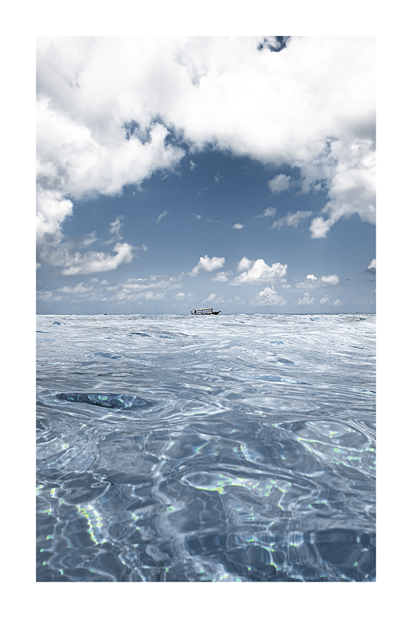 A Boat on the Sea Surface Poster